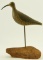Lot #472 - David Rhodes Absecon, NJ standing Eskimo Curlew on driftwood 15 ¾” signed on underside