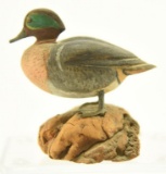 Lot #439 - J. Ahern miniature carved full body standing Green Wing Teal on driftwood 2 ¾” A143