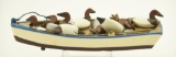 Lot #442 - Hand crafted wooden boat named St. Michaels full of (10) miniature carved Canvasback