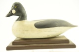Lot #501 - Harry Shourds, Tuckerton, NJ carved Goldeneye drake on stand, Old working re-paint