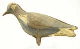 Lot #565 - Primitive “Tinnie” decoy with gunning wear A151.193