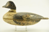 Lot #640A - Early working Goldeneye decoy. Branded on underside Lou McCue. Loss of paint and