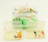 Lot #100 - One container of large Qty of Jigging lures tipped with tubes, (3) Green Machine Type