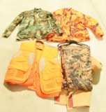 Lot #129 - Carhart 2XL coveralls, Mossey Oak Camo Classic XL camo field pants, Cabela’s XL Orange