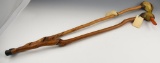 (2) Carved duck head canes each signed Andrew