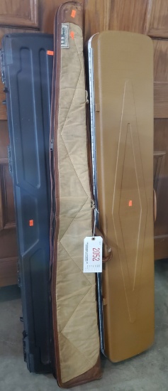 Lot #2052 - (2) plastic rifle cases and one soft padded case