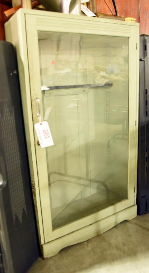 Lot #2051 - Green painted single door 10 gun capacity gun cabinet 54” x 30”