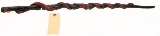 Lot #2351 - Hand carved folk art style red snake walking stick cane (40”)	