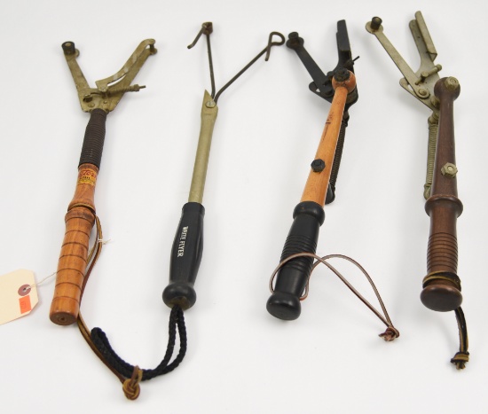 Lot #2261 - (4) Vintage clay pigeon hand throwers: Whiteflyer, Western, Olin, etc