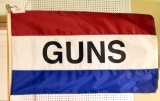 Lot #2038 - “GUNS” advertising flag 58