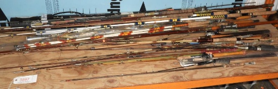 Selection of Approx. 25 Fishing Rods. Most are Fiberglass with a few wooden rods. 2 have