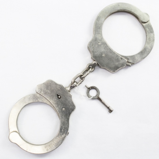 Set of vintage stainless steel Peerless handcuffs