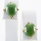 Pair of vintage unmarked 14K yellow gold jade stud earrings