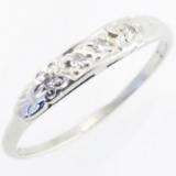 Vintage 14K white gold diamond flower ring