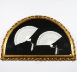 Pair of framed genuine hand-made carved ivory fans with Asian designs