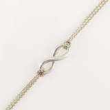 Authentic Tiffany & Co. sterling silver infinity necklace