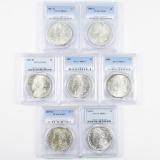 Investor's lot of 7 different certified U.S. Morgan silver dollars