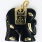 Estate onyx elephant pendant with gold accents