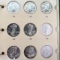 Complete set of 18 uncirculated U.S. American Eagle silver dollars