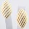 Pair of estate genuine ivory grooved earrings with gold accents