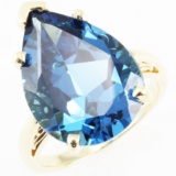 Estate unmarked 14K yellow gold blue topaz ring