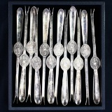 Complete set of 12 antique Argyle silver-plated seafood forks