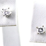 Pair of estate 14K white gold diamond stud earrings