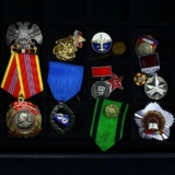 Collection of 13 Soviet Union & Soviet-related pins, badges & medals