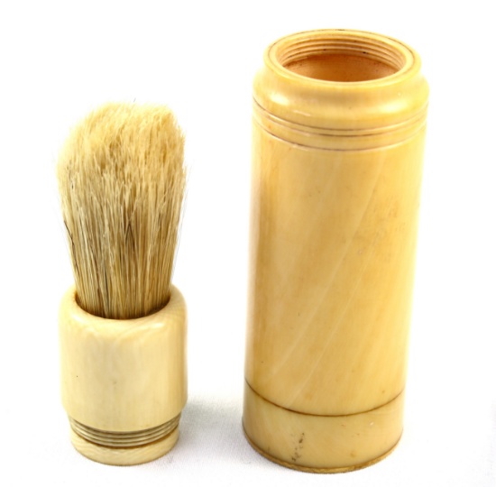 Vintage genuine ivory shaving brush in its original threaded ivory case