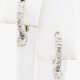 Pair of estate 14K white gold diamond earrings