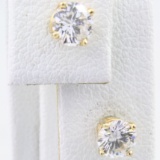 Pair of estate 14K yellow gold diamond stud earrings