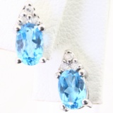 Estate 10K white gold diamond & blue topaz stud earrings