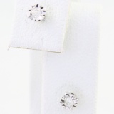 Pair of estate 10K white gold diamond stud earrings