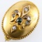 Vintage unmarked 14K yellow gold diamond & emerald fleur de lis pin