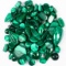 Lot of unmounted malachite: ~1395.00 ctw in mixed-cut cabochons