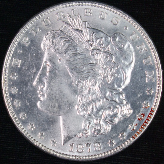 1878 7 tail feathers, 2nd reverse (reverse of 1878) U.S. Morgan silver dollar