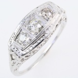 Vintage Art Deco 18K white gold three-stone diamond ring