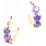 Pair of 10K yellow gold purple cubic zirconia hoop earrings