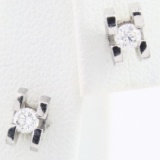 Pair of estate 18K white gold diamond stud earrings