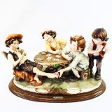 Estate signed G. Armani Capodimonte cheating at cards ceramic figurine