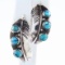 Pair of estate sterling silver Joe Delgarito Navajo curved leaf stud earrings