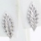 Pair of estate 14K white gold leaf stud earrings