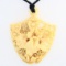 Genuine ivory carved floral motif pendant on black rope cord