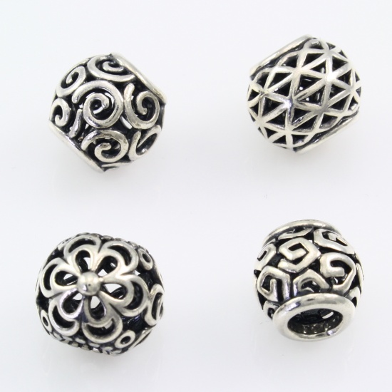 Lot of 4 authentic Pandora sterling silver beads