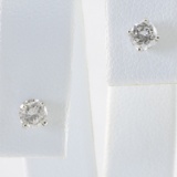 Pair of new 14K white gold diamond stud earrings