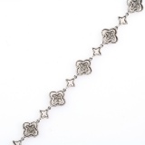 Estate 14K white gold diamond quatrefoil tennis bracelet