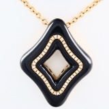 Estate 18K rose gold diamond & onyx quatrefoil necklace