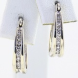 Pair of estate unmarked 14K white gold diamond hoop earrings