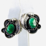 Pair of estate Native American sterling silver turquoise stud earrings