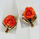 Pair of vintage unmarked 18K yellow gold carved coral rose stud earrings